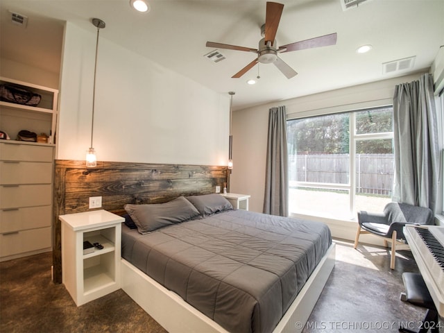 bedroom featuring concrete floors, visible vents, and recessed lighting