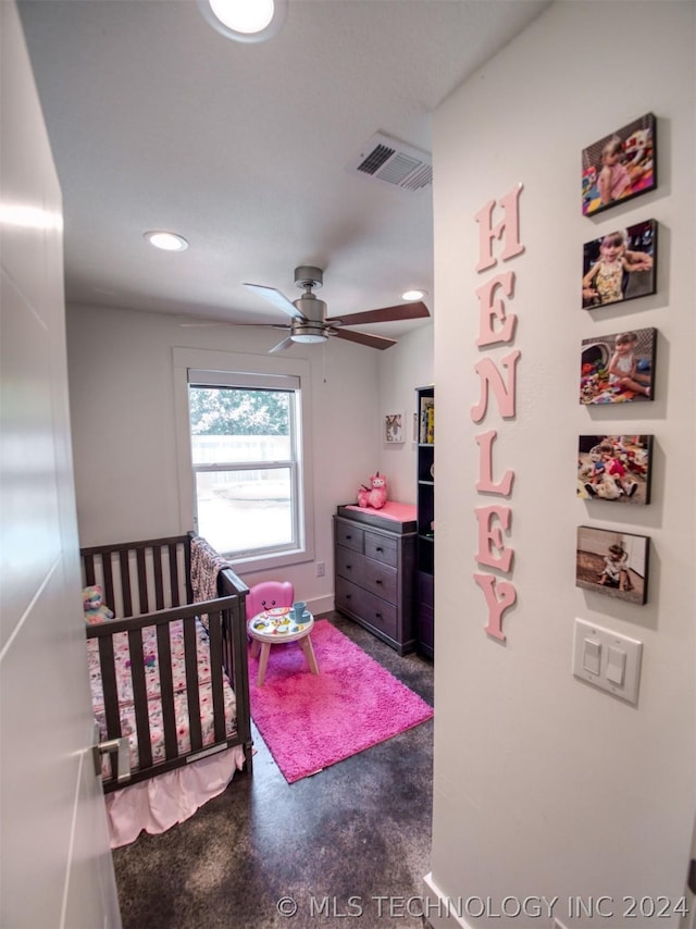 bedroom with concrete flooring, recessed lighting, and visible vents