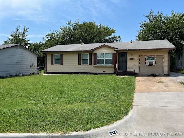 ranch-style house featuring a front yard