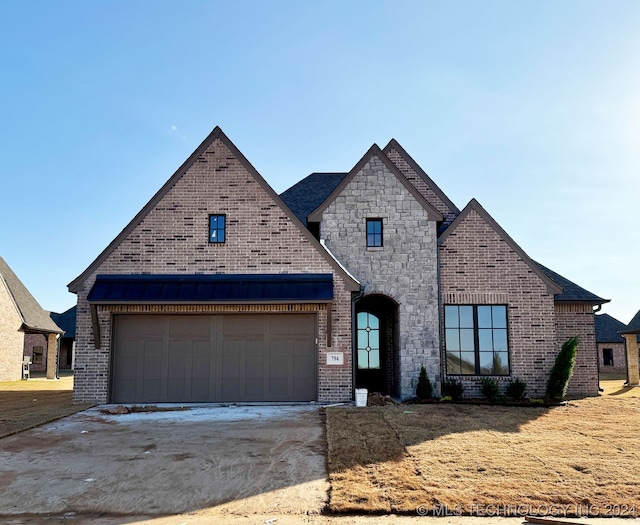 view of front of house with a garage