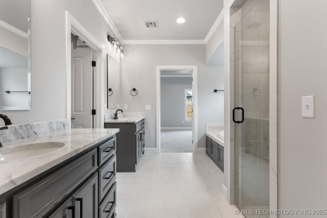 full bathroom featuring visible vents, a sink, crown molding, a shower stall, and two vanities