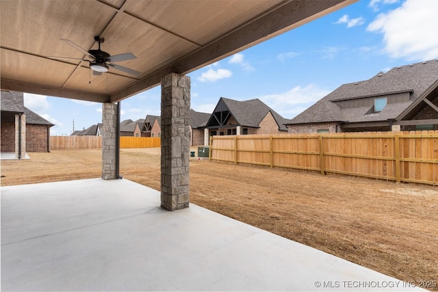 view of patio featuring a fenced backyard and a ceiling fan