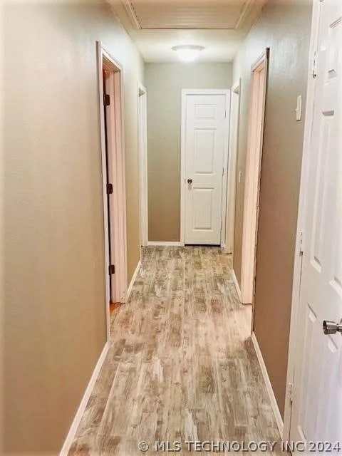 corridor featuring light wood-type flooring