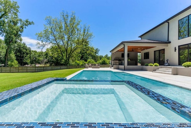 view of swimming pool featuring area for grilling, a yard, ceiling fan, and a patio