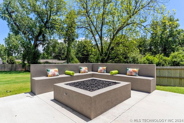 view of patio / terrace with a fire pit