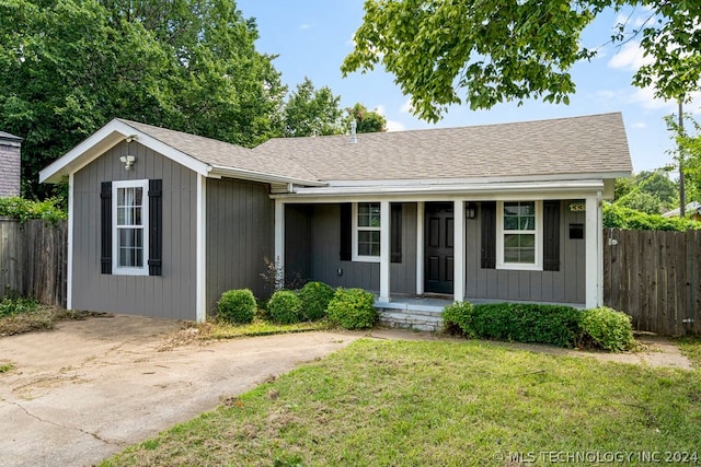 ranch-style house with a front yard