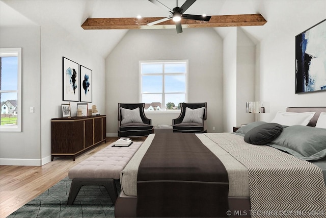 bedroom with vaulted ceiling with beams, hardwood / wood-style floors, and ceiling fan