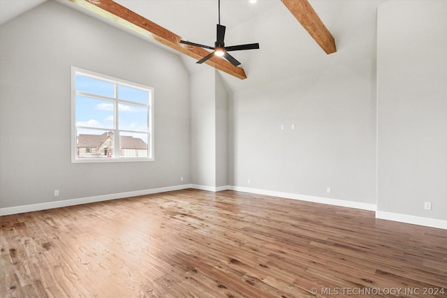 spare room with ceiling fan, high vaulted ceiling, beamed ceiling, and wood-type flooring