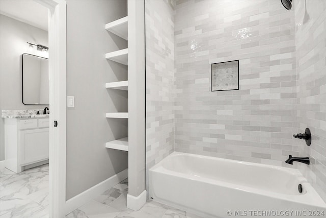 bathroom with vanity and bathtub / shower combination