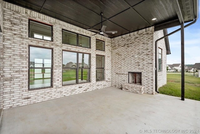 view of patio / terrace featuring ceiling fan