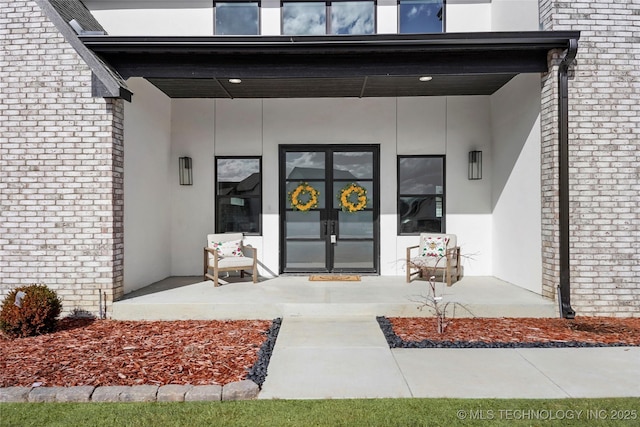 view of exterior entry with french doors