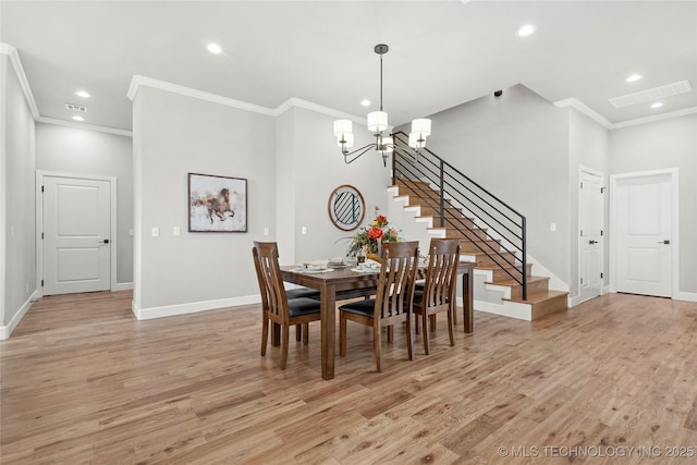 dining space featuring light wood-style flooring, stairway, baseboards, and recessed lighting