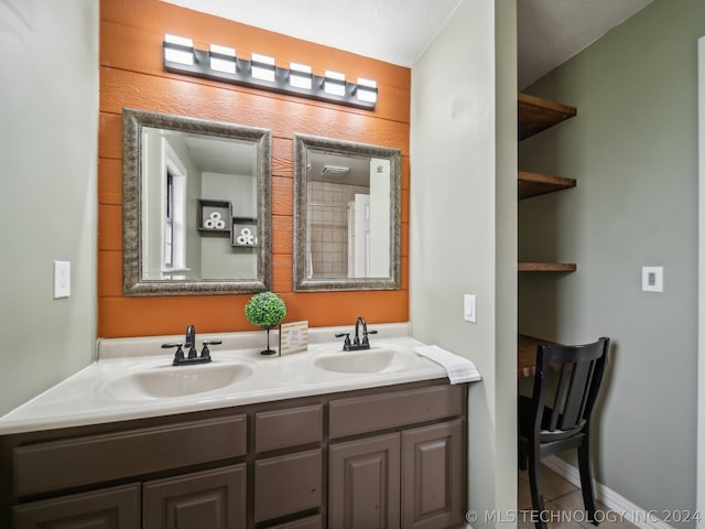 bathroom featuring vanity and tile patterned floors