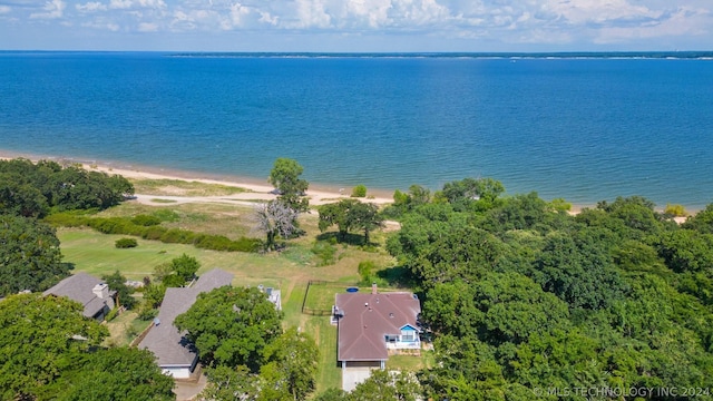 aerial view featuring a water view and a view of the beach