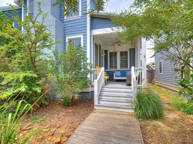 39 Boardwalk St, Carlton Landing, OK 74432 - view of front of house featuring a porch