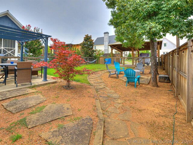39 Boardwalk St, Carlton Landing, OK 74432 - view of yard featuring a pergola and a patio area