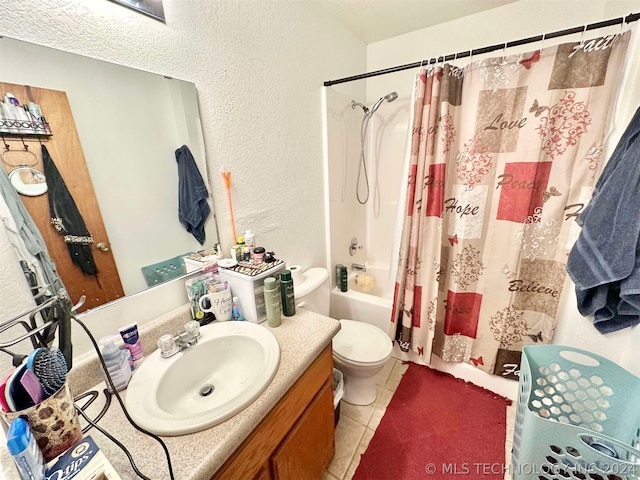 full bathroom with vanity, tile patterned floors, toilet, and shower / tub combo with curtain