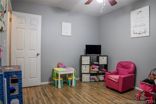 game room with ceiling fan and hardwood / wood-style floors