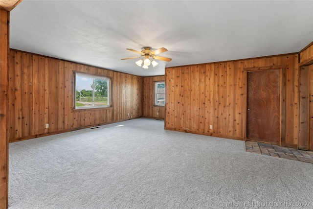 carpeted empty room with ceiling fan