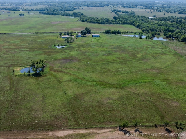 bird's eye view with a rural view and a water view