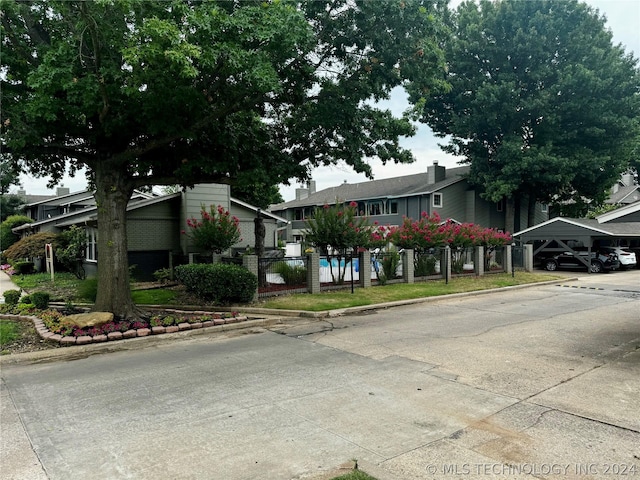 view of front of house with a carport