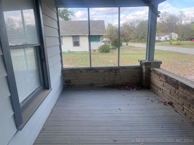 unfurnished sunroom with a healthy amount of sunlight