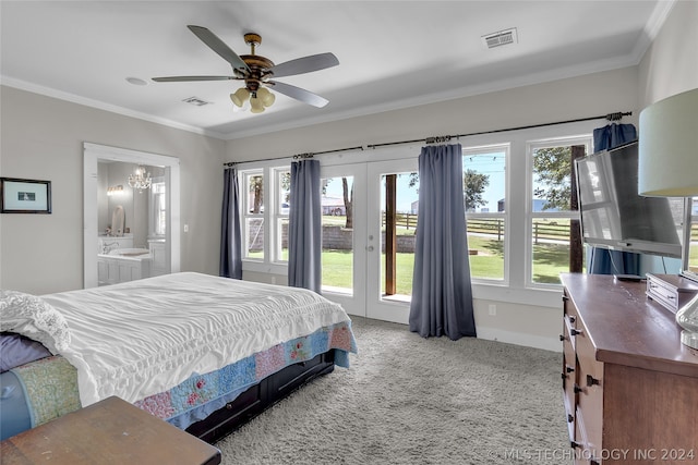 bedroom with carpet flooring, ornamental molding, ensuite bath, and ceiling fan