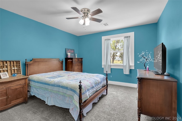 carpeted bedroom featuring ceiling fan