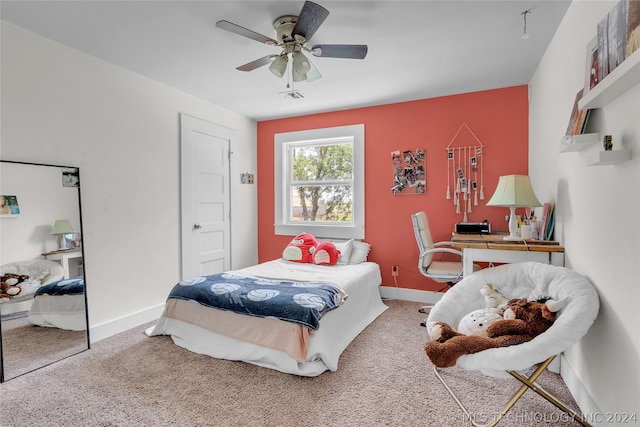 carpeted bedroom featuring ceiling fan