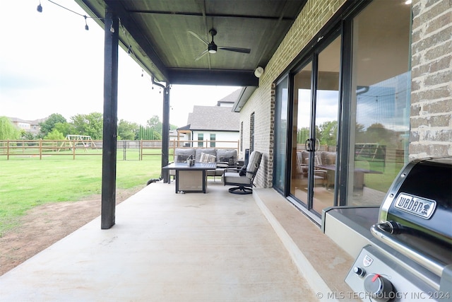 view of patio / terrace featuring ceiling fan