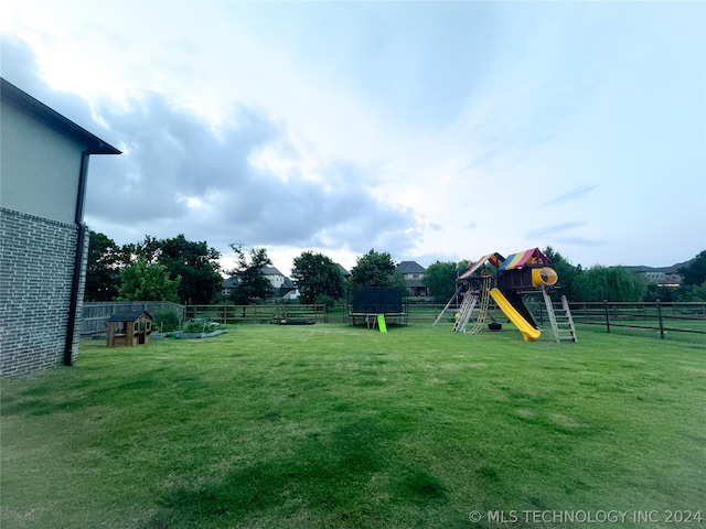 view of yard with a playground