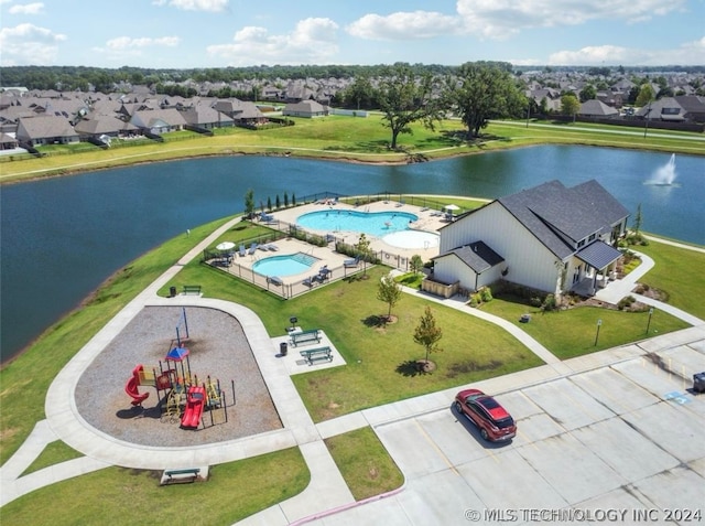 bird's eye view with a water view