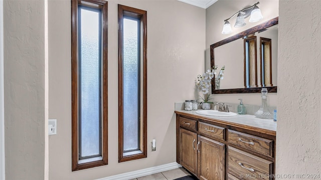 bathroom featuring tile patterned floors and vanity