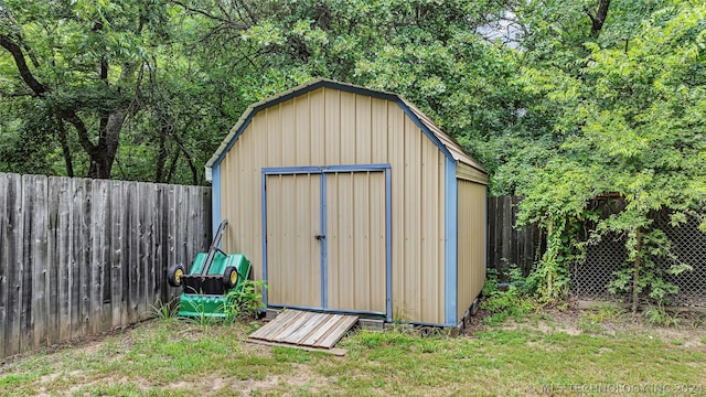 view of outdoor structure featuring a yard