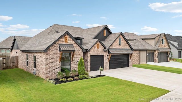 view of front facade with a front lawn and a garage