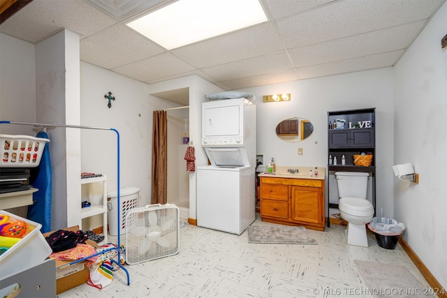 interior space with stacked washer / drying machine