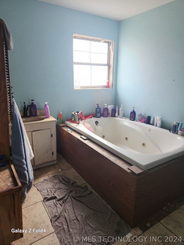 bathroom featuring a tub and tile patterned flooring