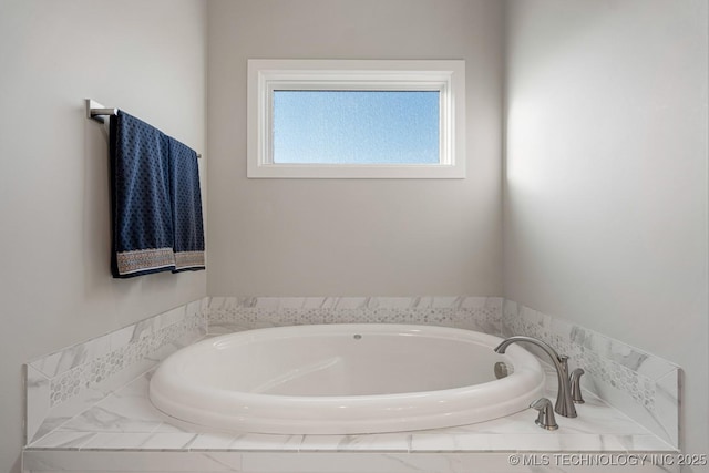 bathroom featuring a garden tub