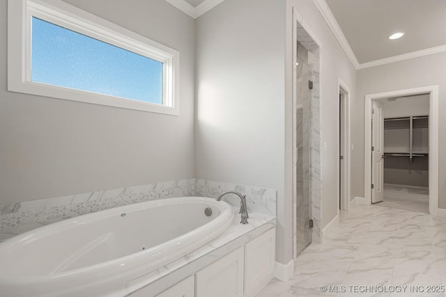 bathroom with ornamental molding, marble finish floor, a walk in closet, a shower stall, and a bath