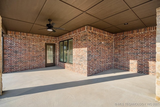 view of patio featuring ceiling fan