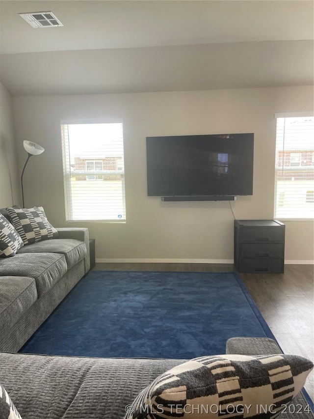 living room featuring dark hardwood / wood-style floors