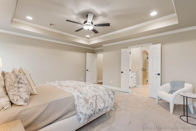 carpeted bedroom featuring crown molding, ceiling fan, and a tray ceiling