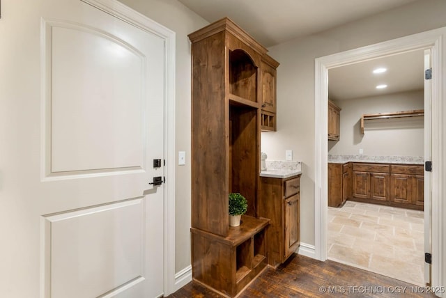 mudroom with hardwood / wood-style flooring