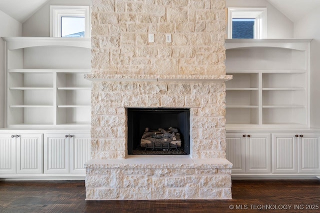 details featuring a stone fireplace