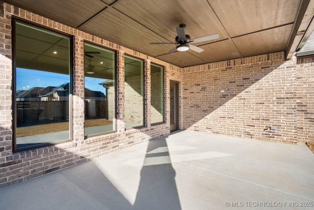 view of patio featuring ceiling fan