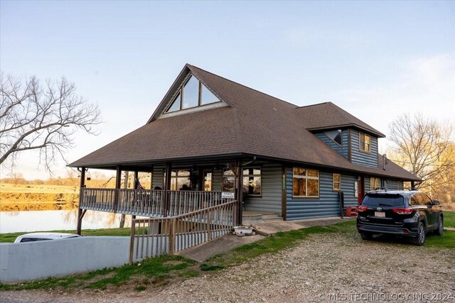 9212 N 447th Rd, Spavinaw, OK 74366 - view of front of house with a shingled roof