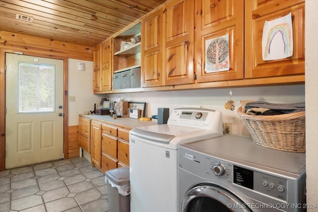 9212 N 447th Rd, Spavinaw, OK 74366 - laundry room featuring washing machine and dryer, wooden ceiling, and cabinet space