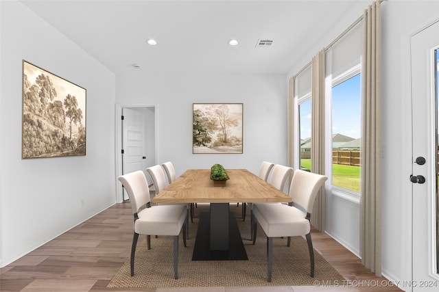 dining area featuring light wood-type flooring