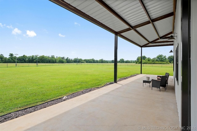 view of patio / terrace featuring ceiling fan