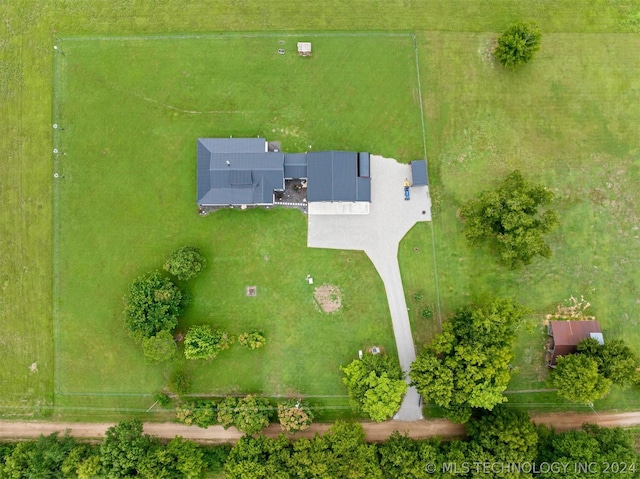 birds eye view of property with a rural view